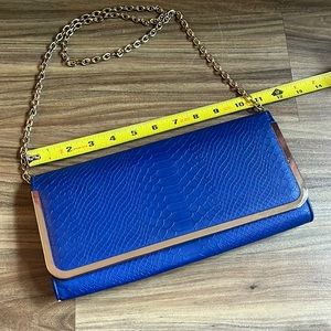 ALDO clutch with optional gold chain strap